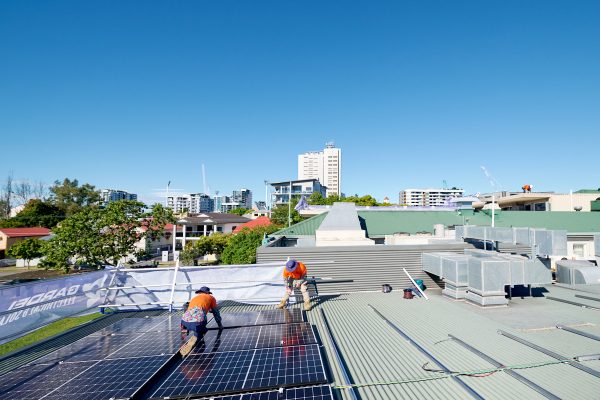 Qualified renewable energy installers from Gardel Electrical & Solar working on the Pineapple Hotel's transition to green energy